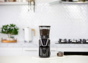 CG112 electric coffee bean grinder in a modern kitchen