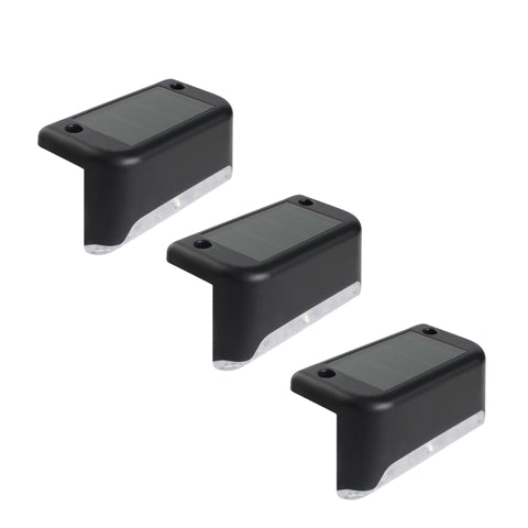 Three solar deck lights on a white background.