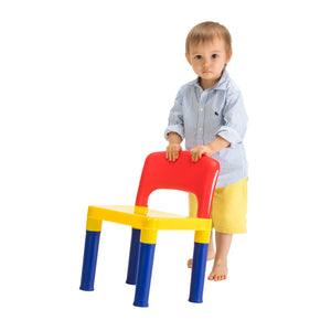 Child holding a colourful chair with red backrest, yellow seat, and blue legs on a white background