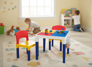 Children's play table with colorful legs and chairs in a room with toys and a child playing.