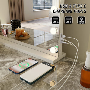 Charging device with USB and Type-C ports on a table next to a mirror.
