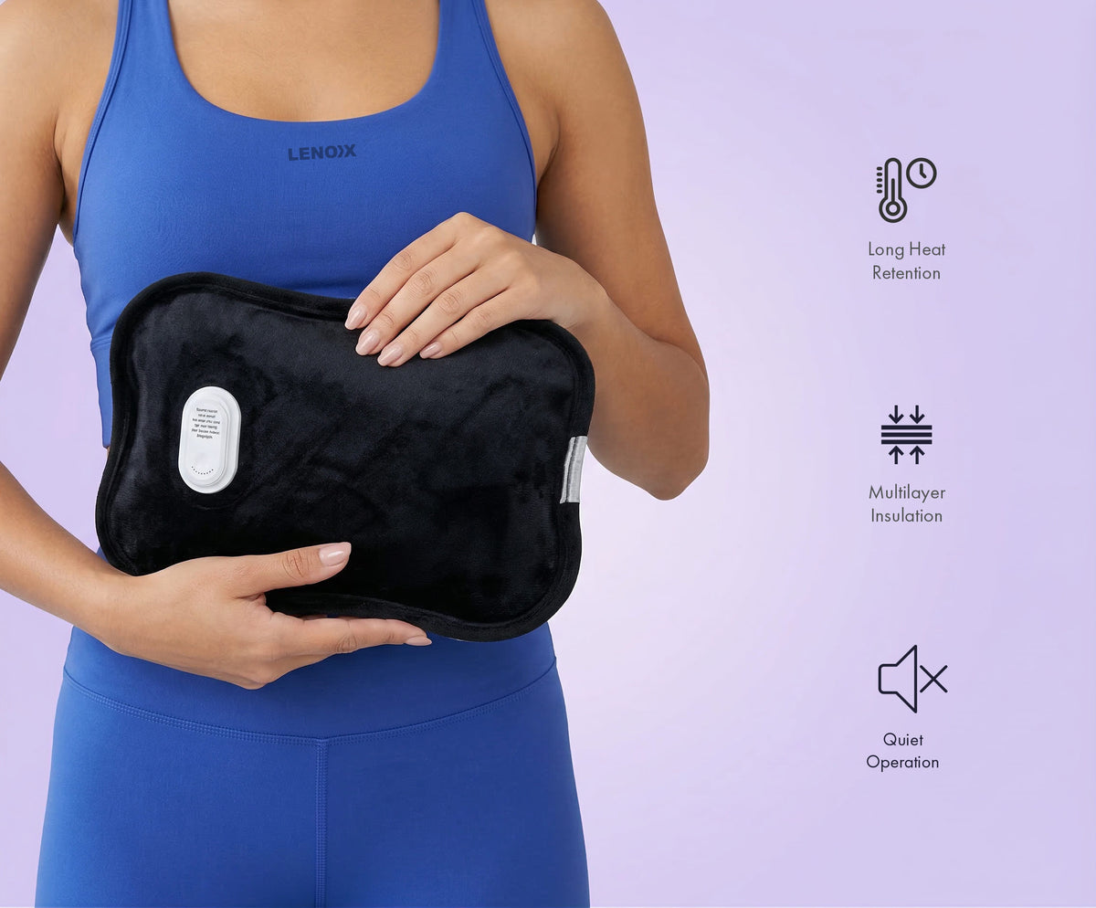 Woman holding the Lenoxx HWB70 Rechargeable Electric Hot Water Bottle.