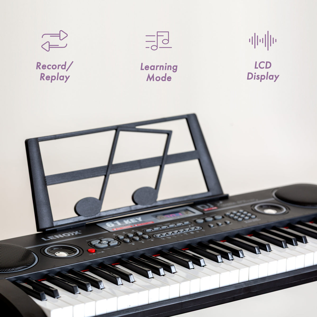 Keyboard with music stand and features listed on a light background