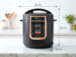 Black pressure cooker with dimensions labeled on a kitchen counter