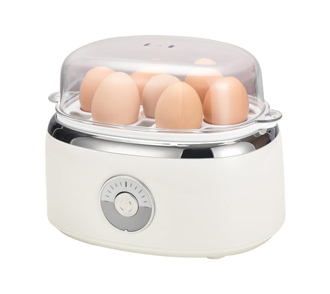 Electric Egg Steamer with 7 eggs in it.