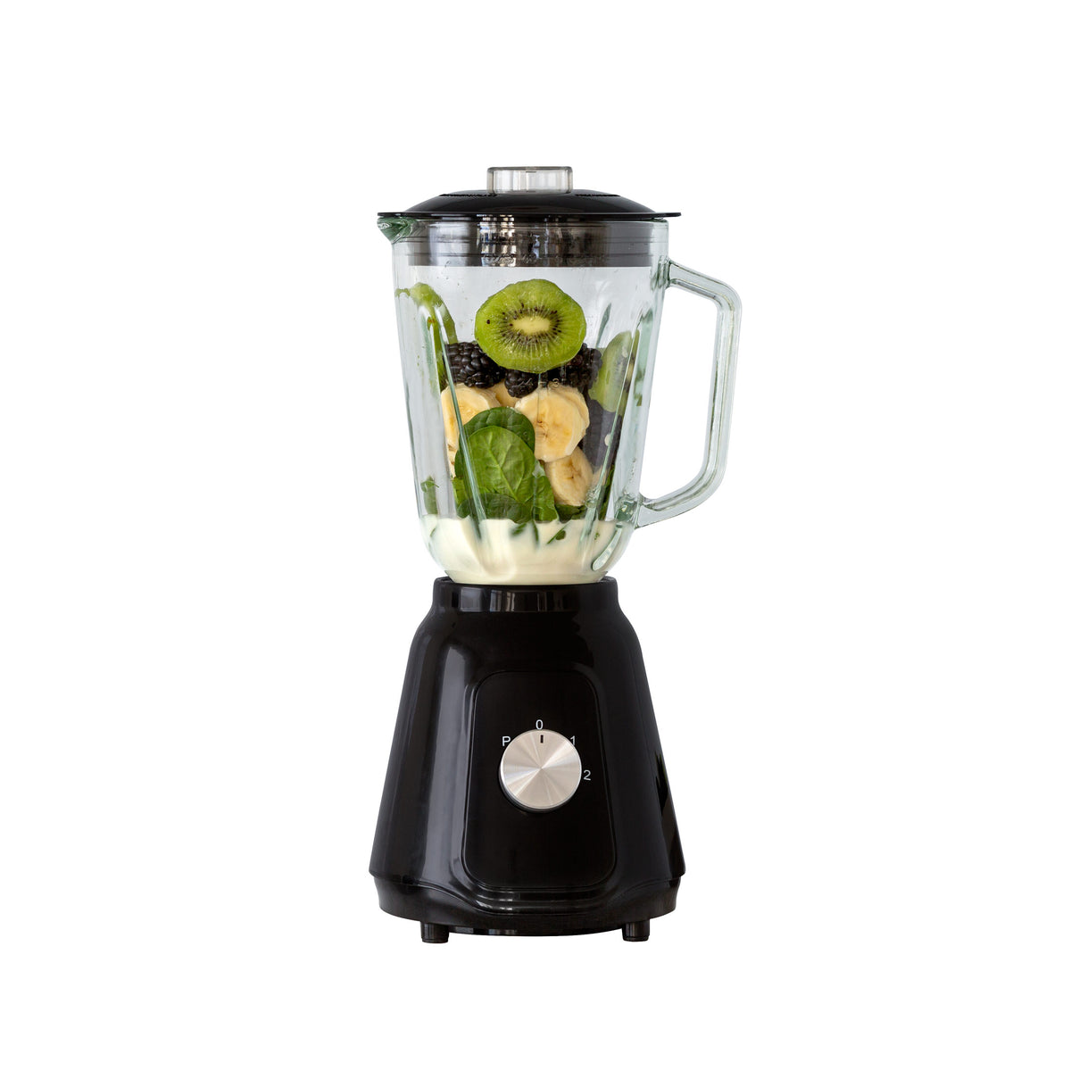 Black table blender filled with fruit ready to make a perfect smoothie.