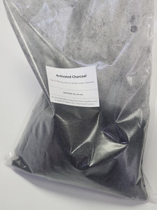 Activated charcoal filter refill in a clear package.
