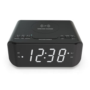 Wireless Qi Phone Charger with FM Radio and clock.