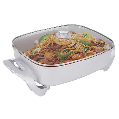 White Copper Electric Fry Pan with stir fry noodles inside and the lid on.