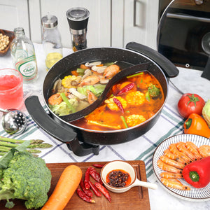 Two kinds of hot pot soups in two parts of the Healthy Choice Electric Fry Pan with Cooking Divider.