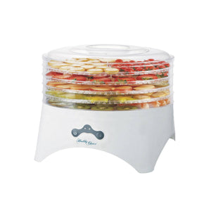 Digital Food Dehydrator fully loaded with mixed fruit.