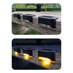 solar deck lights on a wooden deck - photos show how they look at night and during daylight hours.