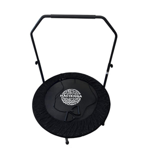 Black Exercise Rebound Fitness Trampoline with two resistance tubes and adjustable handlebar.